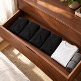 Four Garrison boxer briefs folded in a dresser drawer